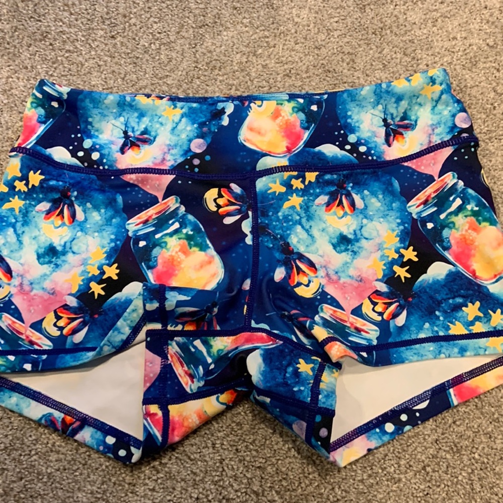 Wodbottom athletic shorts in size L, EUC, 3.25 inseam. Blue with fireflies.